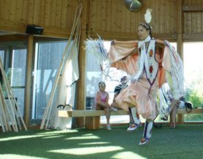 Cara Arkand performing a dance in the Wanuskewin Heritage Park