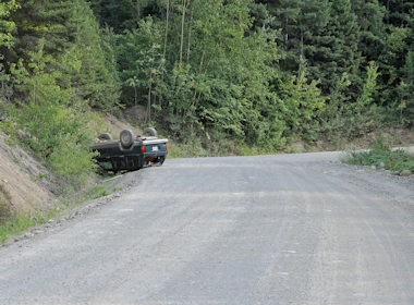 Overturned Car on Highline Road 