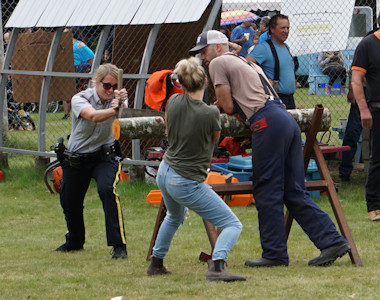 Bella Coola Fall Fair Log saw women 