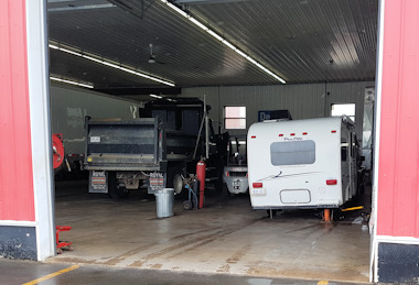 Trailer in bay at MLM Truck & Trailer 